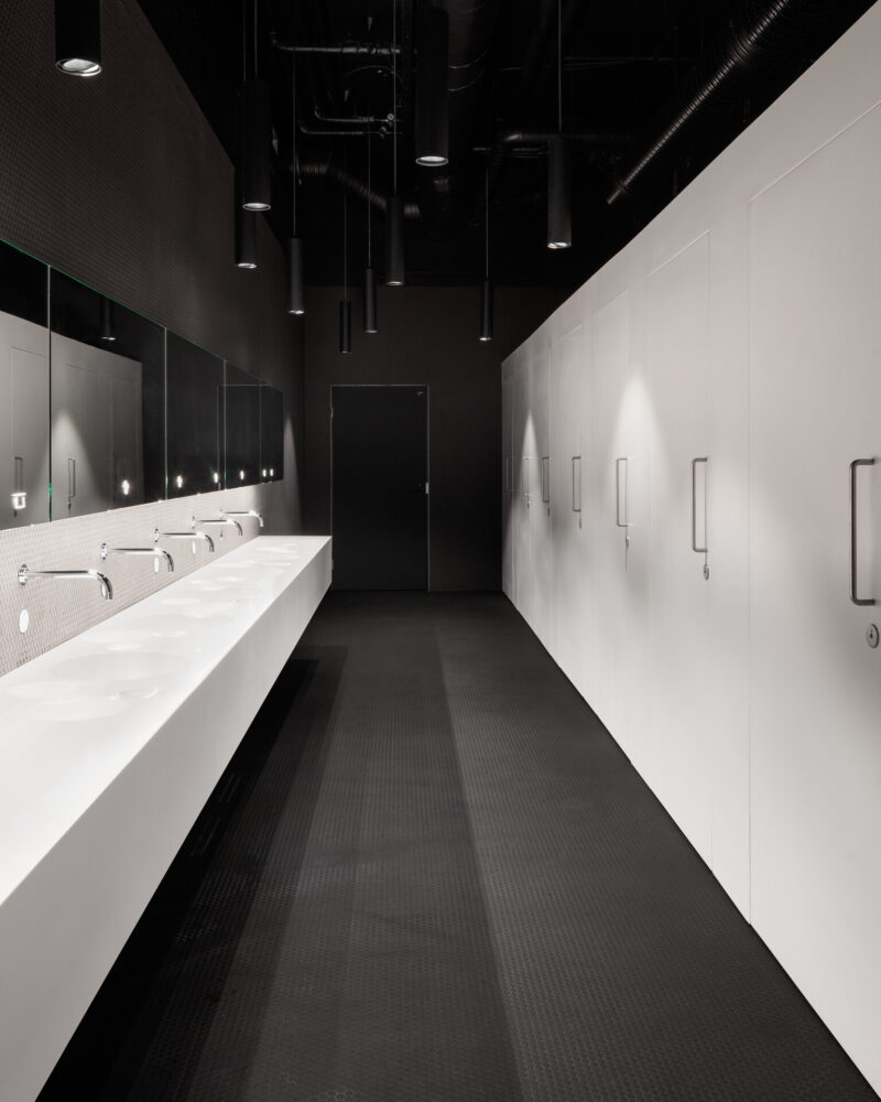 In the toilet section there are many booths. The accessible toilet is in the back.