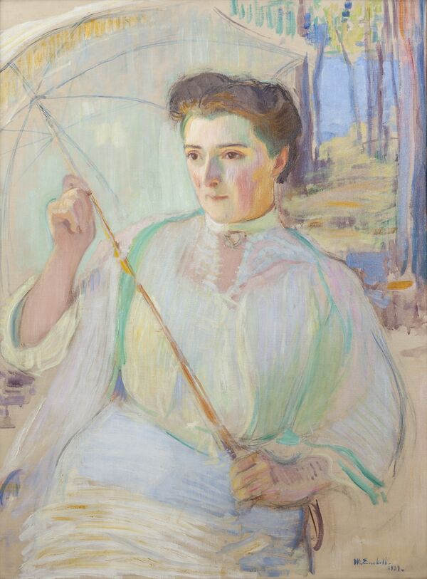 In the painting, Emmy Frosterus is sitting in a white dress under a parasol.